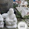 Tượng chú tiểu hoa sen
