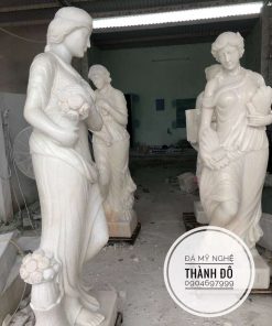 Tượng cô gái 4 mùa đá nguyên khối