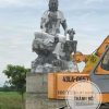 Tượng Quan Âm Tự Tại đá xám đen