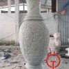 Lục bình đá chạm tứ linh