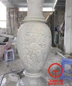 Lục bình đá chạm tứ linh