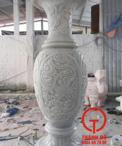 Lục bình đá chạm tứ linh
