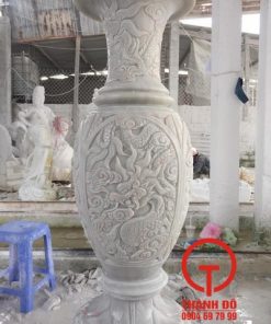 Lục bình đá chạm tứ linh